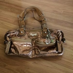 Kathy Van Zeeland copper snakeskin bag